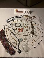 Overview of all pieces arranged on white cloth