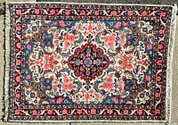 Full view of the rug showing overall design and condition