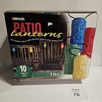 Box packaging showing Woods brand patio lanterns, model Tiki, 10 light set