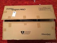 Closed box labeled Easy Shaper Pro by Fitness Quest with warnings and instructions.