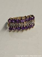 Oblique top view showing all 14 amethysts and 7 diamonds