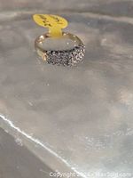 Angled front view showing diamond cluster and overall design