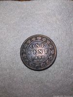 Reverse side showing 'ONE CENT 1890' with maple leaf wreath design