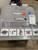 Box showing Fagor brand and various cookware images, confirming the product is a Fagor multi cooker.