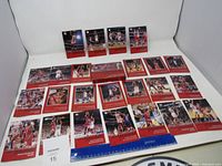 Overview photo of 20 Michael Jordan basketball cards arranged on a white background.