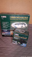 Boxed inflatable boat and boxed electric air pump together