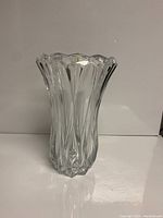 Front view of the clear crystal JG Durand vase placed on a flat surface against a plain background.