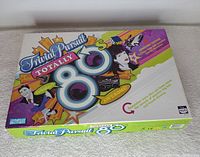 Top view of the Trivial Pursuit Totally 80's game box with colorful 80's graphics on lid.