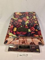 Three sealed vintage Springbok puzzles stacked with the top one featuring assorted peppers.