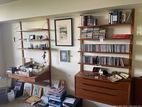 Both shelving units mounted side by side with contents