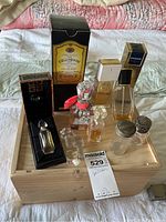 Main photo showing multiple vintage perfume bottles on wooden box including Givenchy Ysatis in box, Eau de Cologne box, glass bottles with crystal stoppers and spray tops.