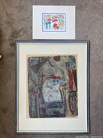 Both prints displayed—smaller matted print above larger framed abstract print