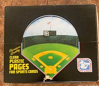 Box packaging showing baseball field design and branding of trading card collector pages for sports cards.