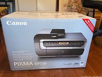 Boxed Canon Pixma MP530 Office All-in-One printer showing front product image and branding.