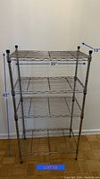 Front view of a 4 tier metal wire shelving unit with measurements overlay showing height 43 inches, width 23 inches, and depth 13 inches. The shelves are made of wire grid and the frame is metal showing some rust.
