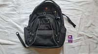 Front view of one black backpack with multiple compartments visible