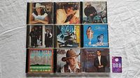 Front covers of 10 music CDs laid out in two rows showing artists Terri Clark, Clint Black, Alan Jackson, Little Texas, Bryan White, among others.