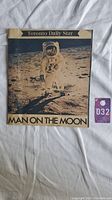 Front page of Toronto Daily Star newspaper featuring astronaut on the moon with headline 'Man on the Moon'