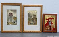 Photo showing all three items: two framed watercolors and one religious icon panel, side by side