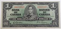 Full face of 1937 Canadian one dollar banknote with serial number and King George VI portrait.