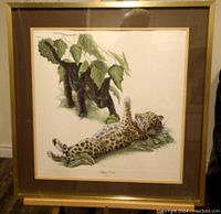 Full view of framed lithograph print showing two jaguar cubs with foliage, signed by I H Farnsworth.