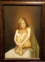 Full view of framed oil painting of a nude seated girl on canvas, showing composition and frame.