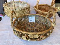 Three woven baskets together showing variety in styles and colors