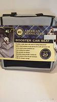 Image of American Kennel Club Dog Booster Car Seat packaging showing use, safety features, material details, and size limit for pets up to 20 lbs.