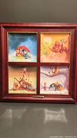 Front view of the framed set of 4 Winnie the Pooh seasonal art pieces with reddish wooden frame and brass plaque.