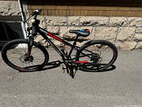 Full side profile of the bike showing frame, fork, wheels and saddle