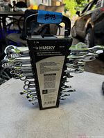 Front view of the Husky wrench set with visible product label and sizes listed on the holder.