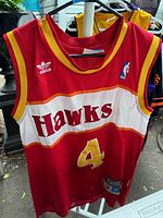 Front view of red Atlanta Hawks hardwood classics NBA jersey with #4 and Webb name patch.