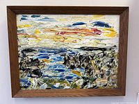 Frontal view of the thick impasto oil painting showing vibrant abstract landscape with visible textured brushstrokes and signed by artist.