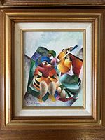 Full view photo of the cubist musicians painting in gilt wood frame showing artwork surface and frame details.
