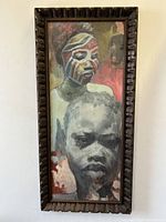 Full frontal view of painting with carved wood frame