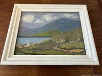 Frontal view of framed tweed wool landscape showing full scene and frame
