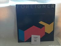 Front cover of Foreigner 'Agent Provocateur' vinyl LP album in shrink wrap showing original sealed condition.
