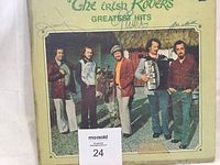 Front view of the album cover showing the full photo of band members with donkey and all signatures on the cover.