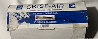 Photo of the Crisp-Air branded box for 2 inch L type flooring nails, showing blue and white packaging with product labeling.
