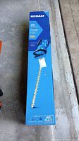 Box of Kobalt 40V Max 24-inch hedge trimmer with image of product on front.