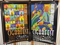 Two Cigarfest posters displayed side by side: the left one 2007 edition with cigar grid art, the right one 2008 edition with abstract art.