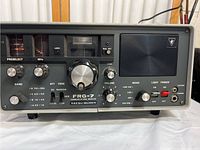 Front view showing tuning knob, S-meter, band and mode controls