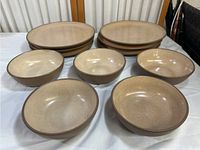 Overview of all plates and bowls arranged on table