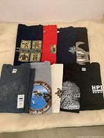 Overview of printed Hawaii-themed men's T-shirts