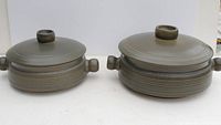 Two Denby Sherwood casserole dishes side by side showing their size difference, color and form.