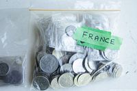 Collection of various French coins mostly loose and some in clear plastic holders.
