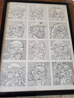 Full view of framed print showing twelve abstract portrait illustrations in black lines on white background.