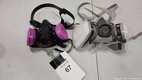 Two respirators side by side, showing color and filter types.