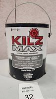 Front view of KILZ MAX paint primer can with label showing product branding and formula details.
