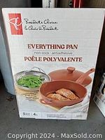 Box front showing branding and product name 'Everything Pan' by President's Choice, stating non-stick attributes.